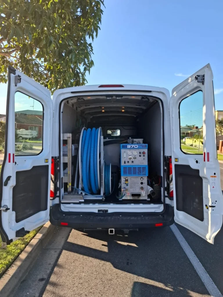 Flood Restoration Geelong van parked at residential property with professional water damage restoration equipment