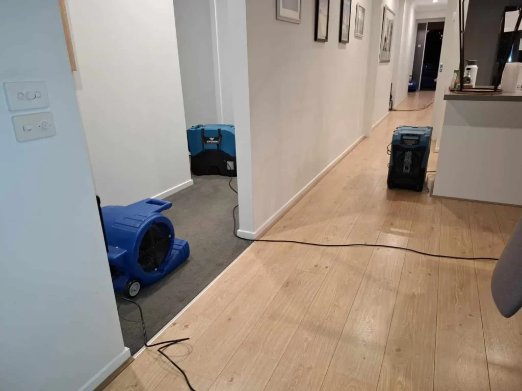 Whole floor of a Geelong home affected by flooding with professional flood restoration and drying in progress